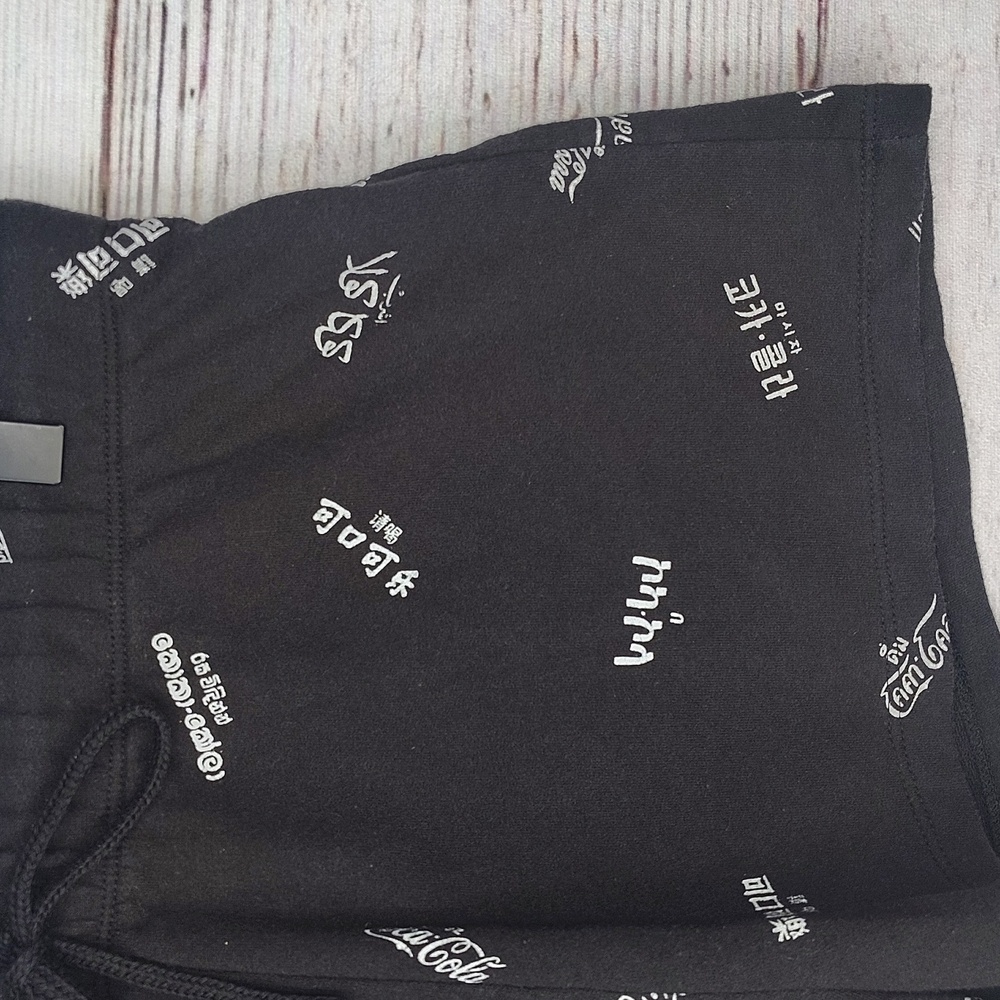 Coca Cola In Different Language Shorts - Picture 3 of 7